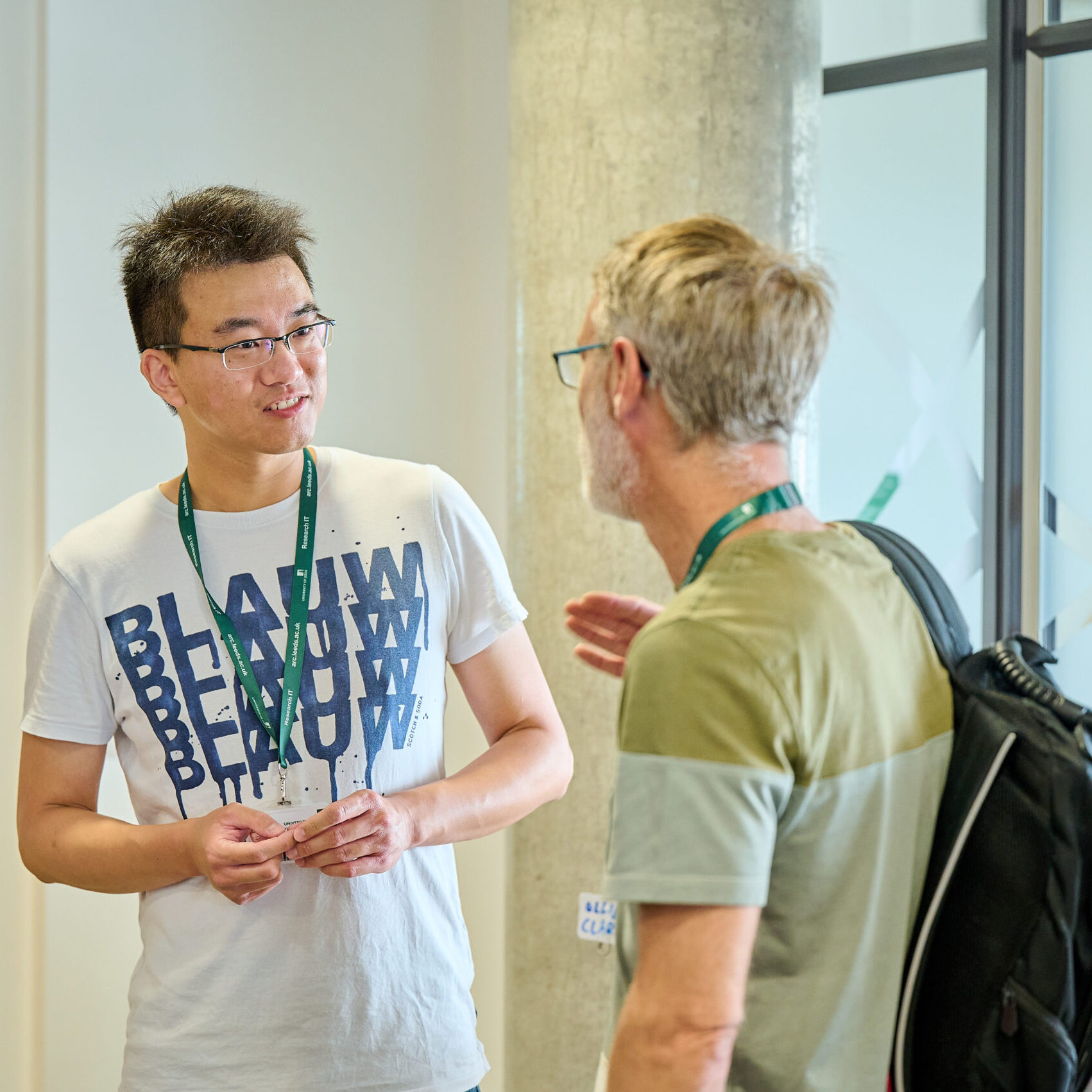 two researchers talking