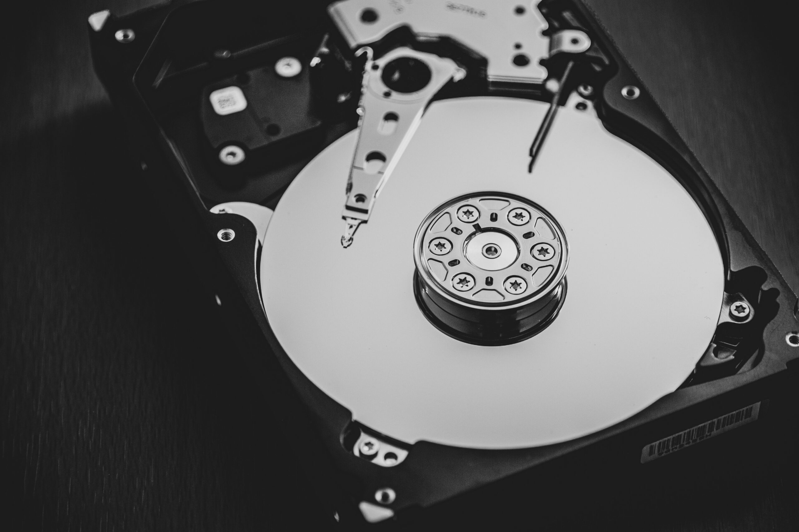 Grayscale photo of a hard disk drive.